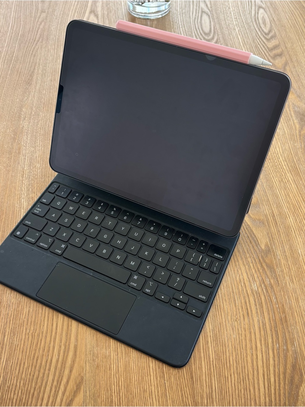 Apple iPad pro 2nd gen with Black Keyboard Case and Pink Apple Pencil